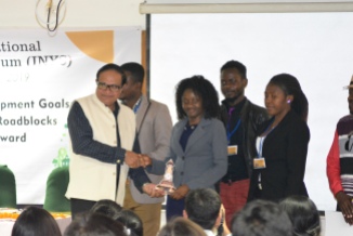 Delegates from Africa are being presented the awards by Prof. Pawan K. Chugan, the Guest of Honor, at 4th International Youth Symposium held at B. K. School of Business Management, Gujarat University, Ahmedabad during Feb 1 -2. 2019