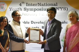 The award winners of the 4th International Youth Symposium are being presented the awards by Prof. Pawan K. Chugan, the Guest of Honor of the Valedictory Function held at B. K. School of Business Management, Gujarat University, Ahmedabad on Feb. 2, 2019